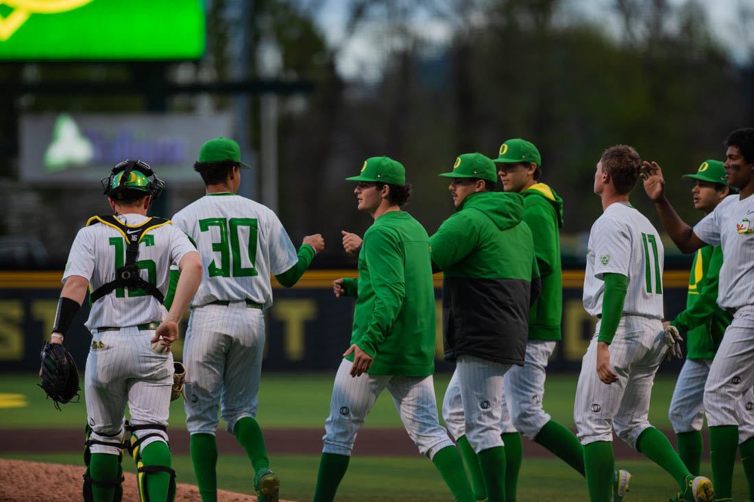 The Ducks celebrate on the field after a 15-5 win against San Fransisco. Oregon Baseball takes on the University of San Fransisco at PK Field in Eugene, Ore. on March 29, 2022. (Mary Grosswendt/Emerald)