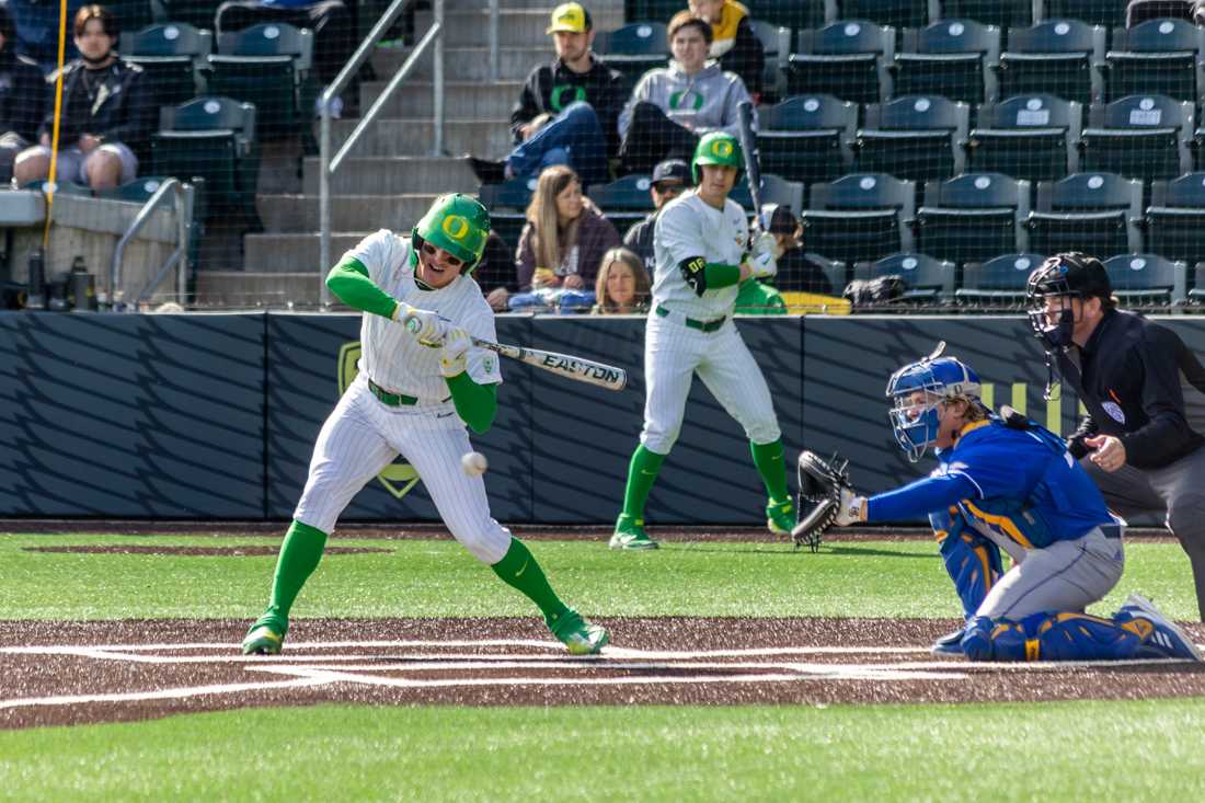 Oregon&#8217;s Tanner Smith (31) swings for the ball. The Oregon Ducks Baseball team takes on UCSB on March 5th, 2022, at PK Park. (Molly McPherson/Emerald)