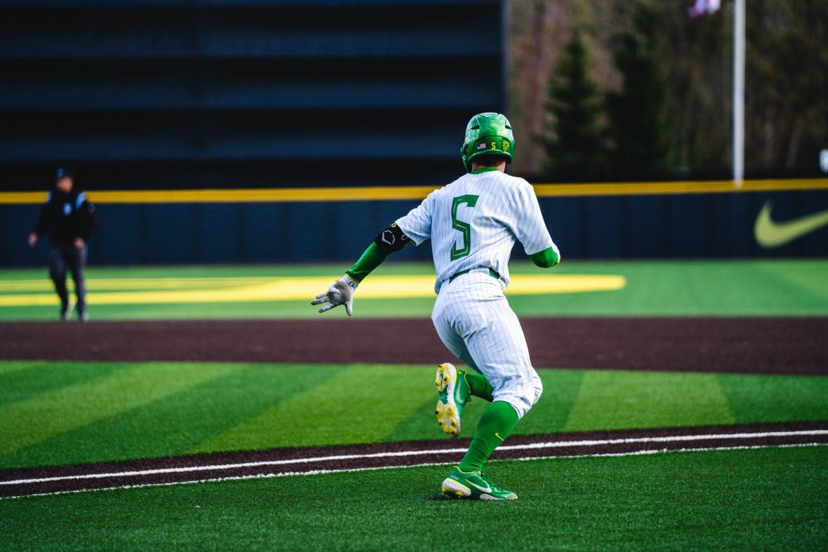 Gavin Grant (5) runs towards first base. The University of Oregon Ducks staged a late-game comeback to win 8-6 against the Utah Utes on March 19, 2022 at PK Park. (Will Geschke/Emerald)