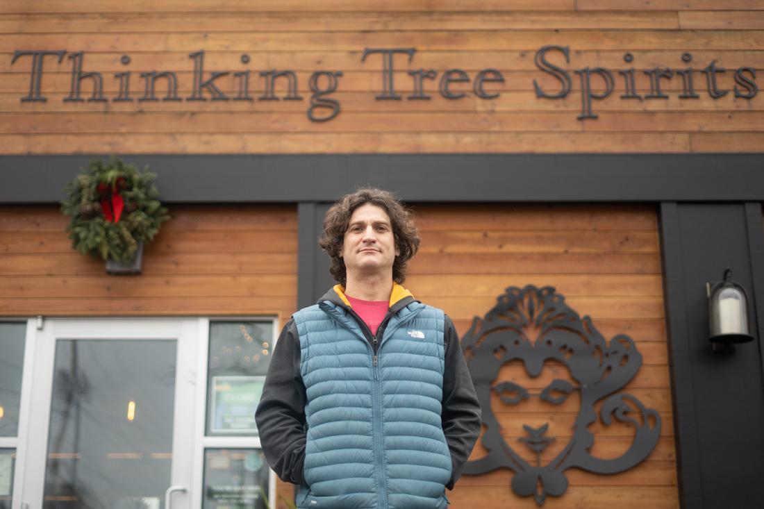 Owner Kaylon McAlister, stands in front of his distillery, Thinking Tree Spirits. Located on 88 Jackson St, Eugene Ore., Thinking Tree Spirits is one of a few distilleries in the Eugene area.