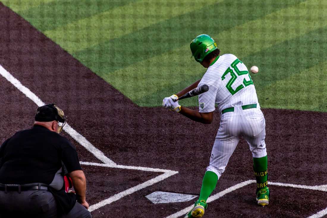 Jacob Walsh (25) swings for the ball. The Oregon Ducks Baseball team takes on Washington State on April 23th, 2022, at PK Park. (Molly McPherson/Emerald)