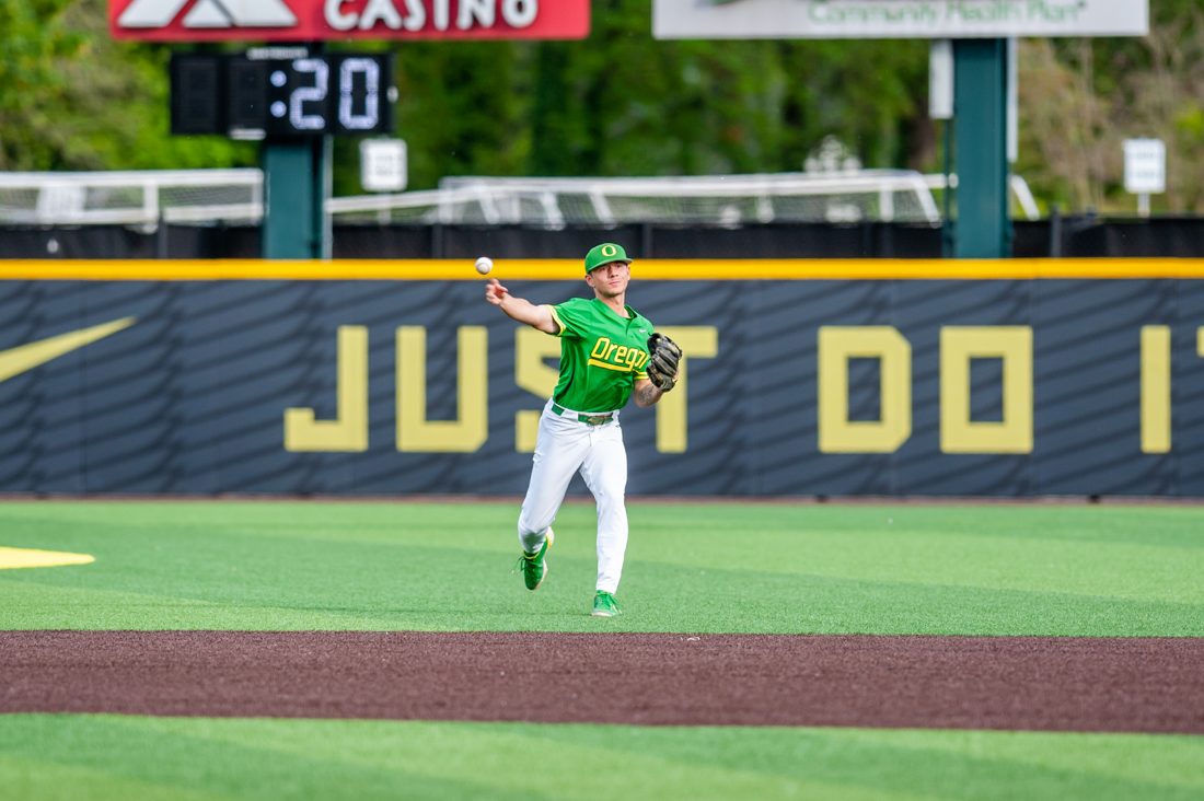 Gavin Grant (05) throws the ball to his teammate. The Oregon Baseball team takes on Gonzaga on May 17th, 2022, at PK Park. (Molly McPherson/Emerald)