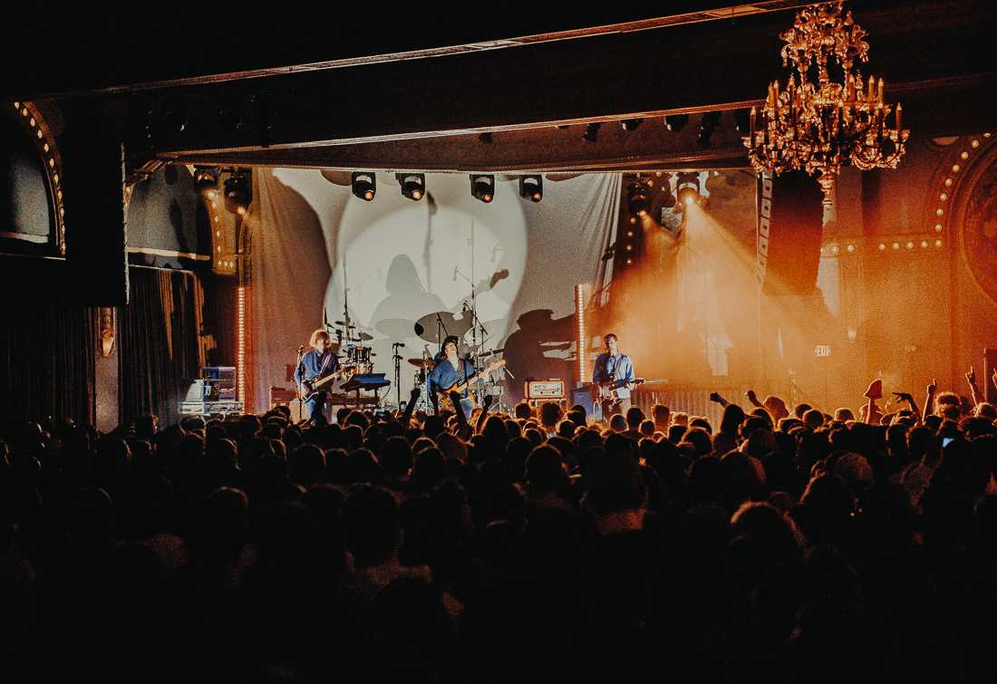 Parquet Courts is Andrew Savage (vocals, guitar), Austin Brown (vocals, guitar, keyboard), Sean Yeaton (bass, vocals), and Max Savage (drums). New York rock band Parquet Courts headlines the Crystal Ballroom in Portland, Ore., on April 25th, 2022. (Ian Enger/Emerald)