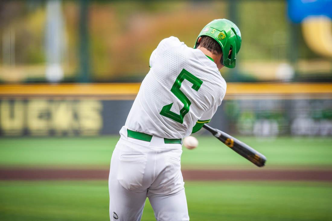 Gavin Grant (5) hits the ball while up at bat. Oregon Baseball takes on the Washington State Cougars at PK Field in Eugene, Ore. on April 22, 2022. (Mary Grosswendt/Emerald)