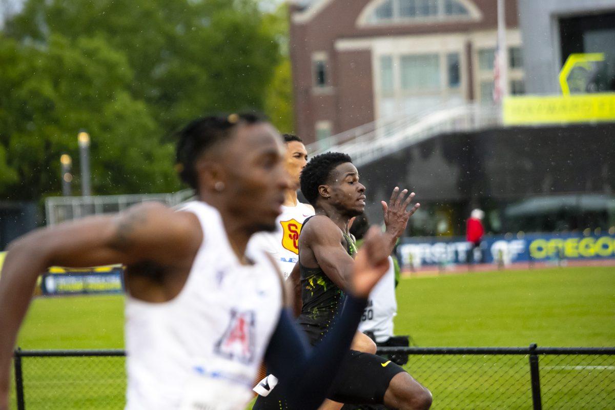 Micah Williams leads the 200m by the slightest of margins. Oregon hosts the 2022 Pac-12 Track and Field Championships at Hayward Field on May 13th, 2022. (Liam Sherry/Emerald)