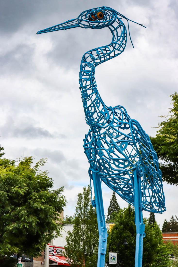 <p>The Blue Heron, by Jud, is made from various recycled metals and can be found on 13th Avenue and Alder Street. Two Eugene-based artists share a love for art as their sculptures, made of recycled materials, can be seen around Eugene and the world. (Mary Grosswendt/Emerald)</p>