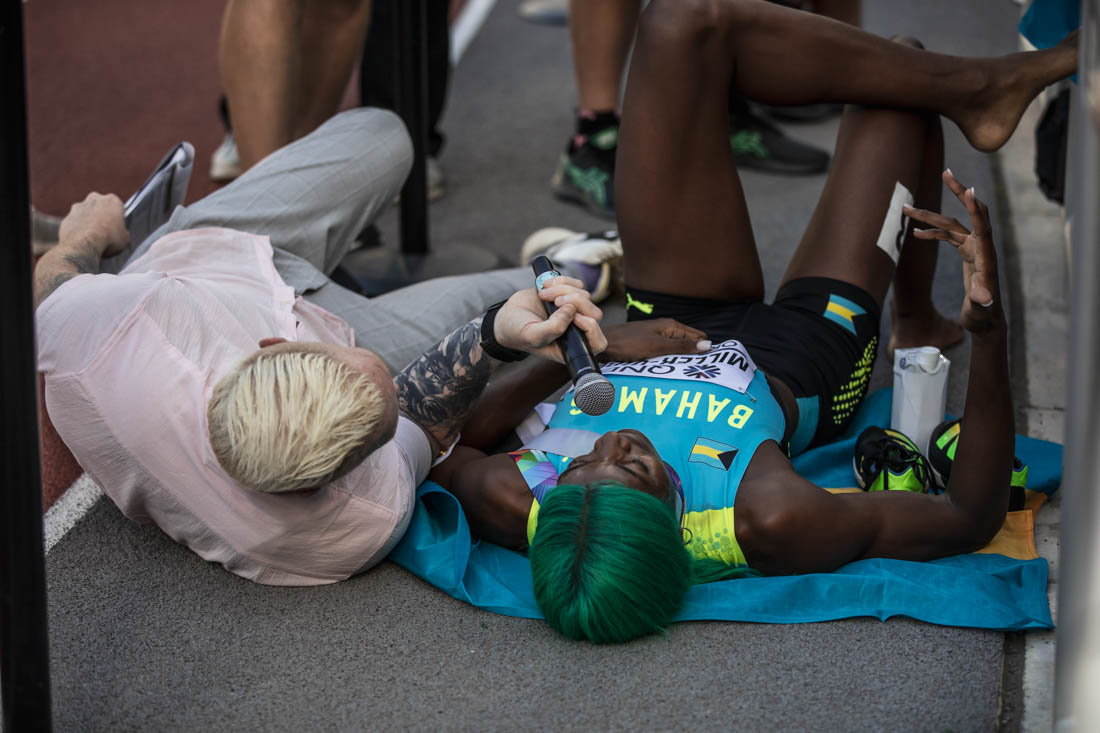 Womens 400m gold medalist Shaunae Miller-Uibo is interviewed on the ground as she takes time to recover after her win. The World Athletics Championships continue onto day eight at Hayward Field in Eugene, Ore., on July 22, 2022. (Maddie Stellingwerf/Emerald)