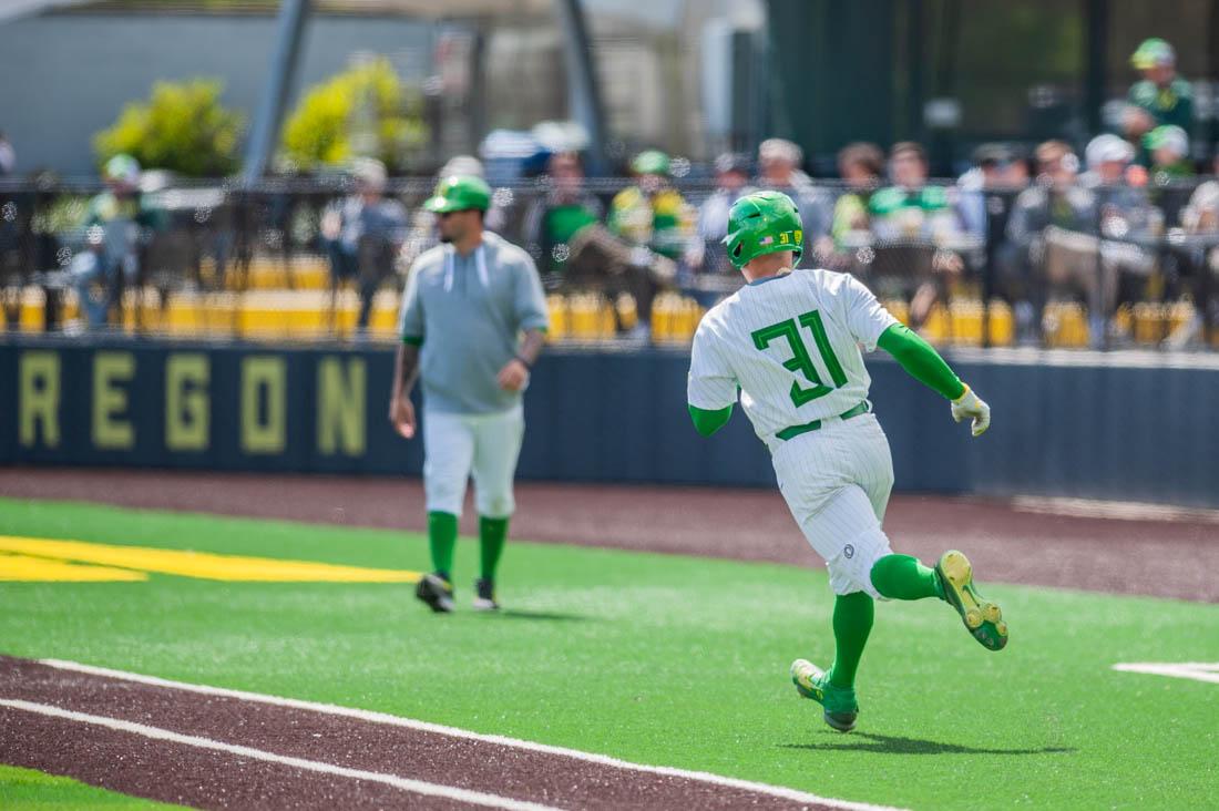 Tanner Smith (31) heads to first base after a hit. Oregon Baseball takes on Ball State on April 9th, 2022 in Eugene, Ore. (Mary Grosswendt/Emerald)