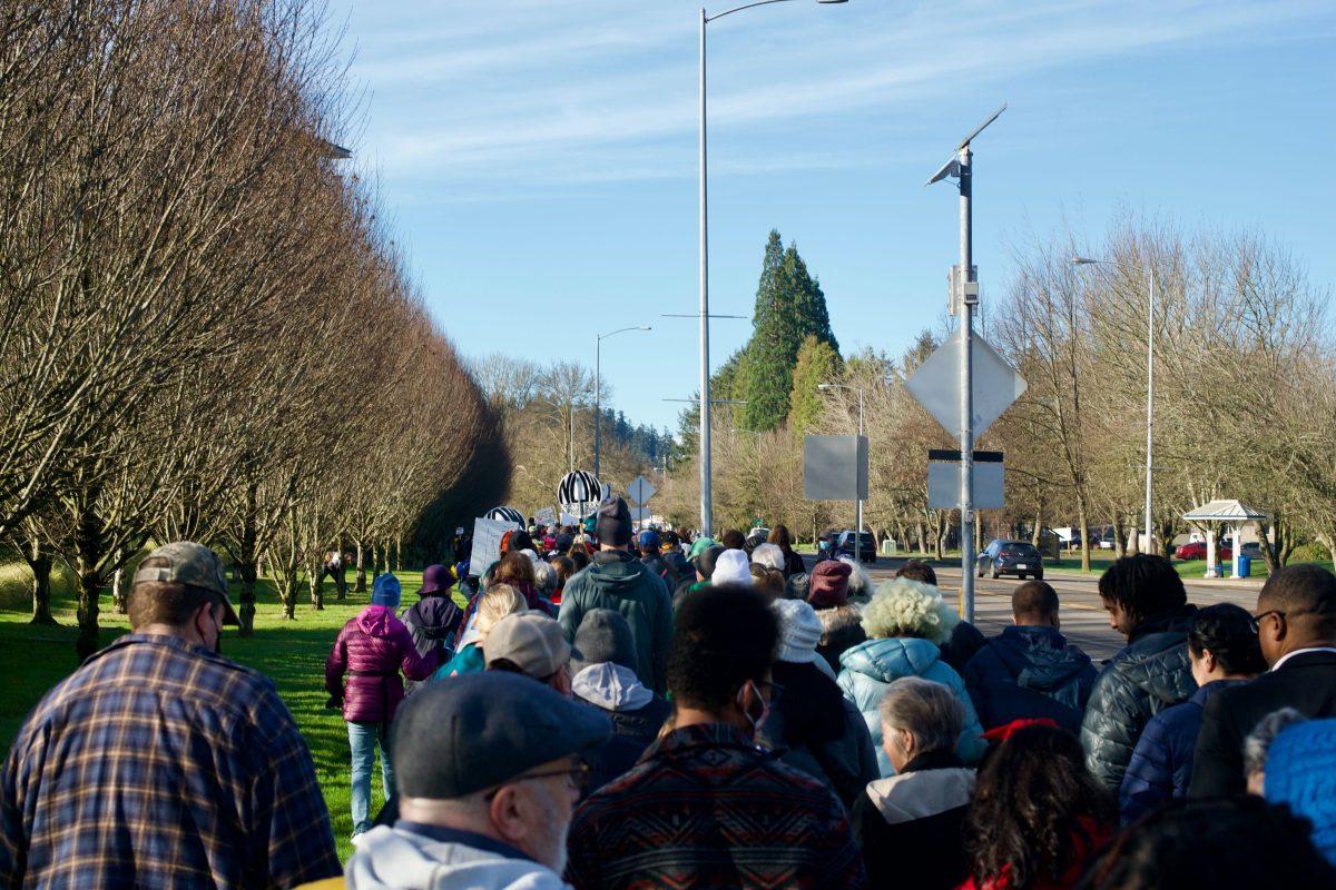 People gathered at Autzen Stadium to march in honor of Martin Luther King Jr. Day.