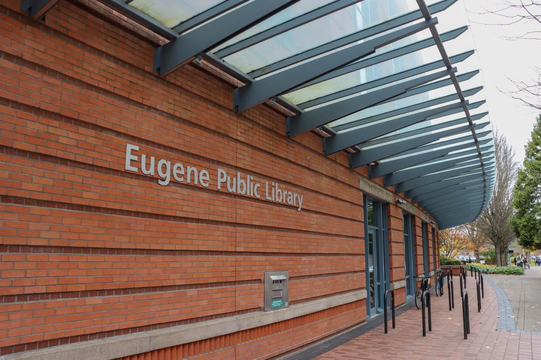 The library is located on W. 10th Avenue and offers a large selection of books and other services to Eugene citizens. The Eugene Public Library has returned to pre-pandemic hours and the staff recognizes the importance of the library in the community. (Mary Grosswendt/Emerald)