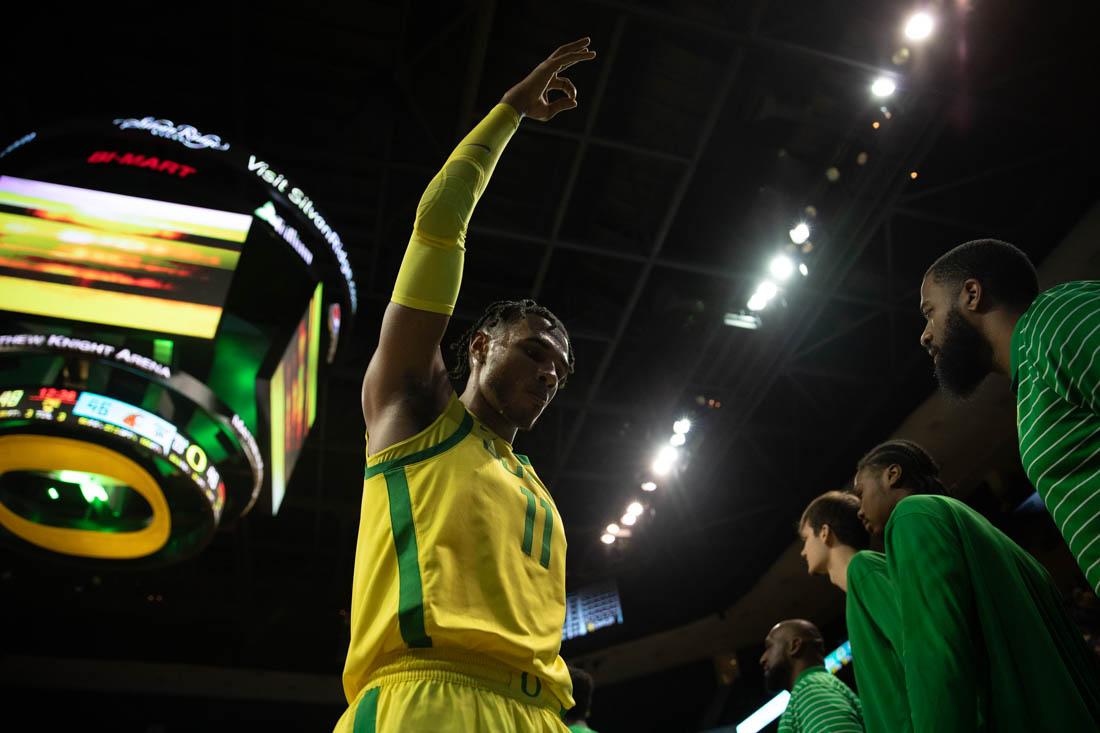 Ducks guard Rivaldo Soares (11) celebrates his teams successful three-pointer. Oregon Mens Basketball host the Washington State Cougars at Matthew Knight Arena in Eugene, Ore., on Dec. 1, 2022 (Maddie Stellingwerf/Emerald)