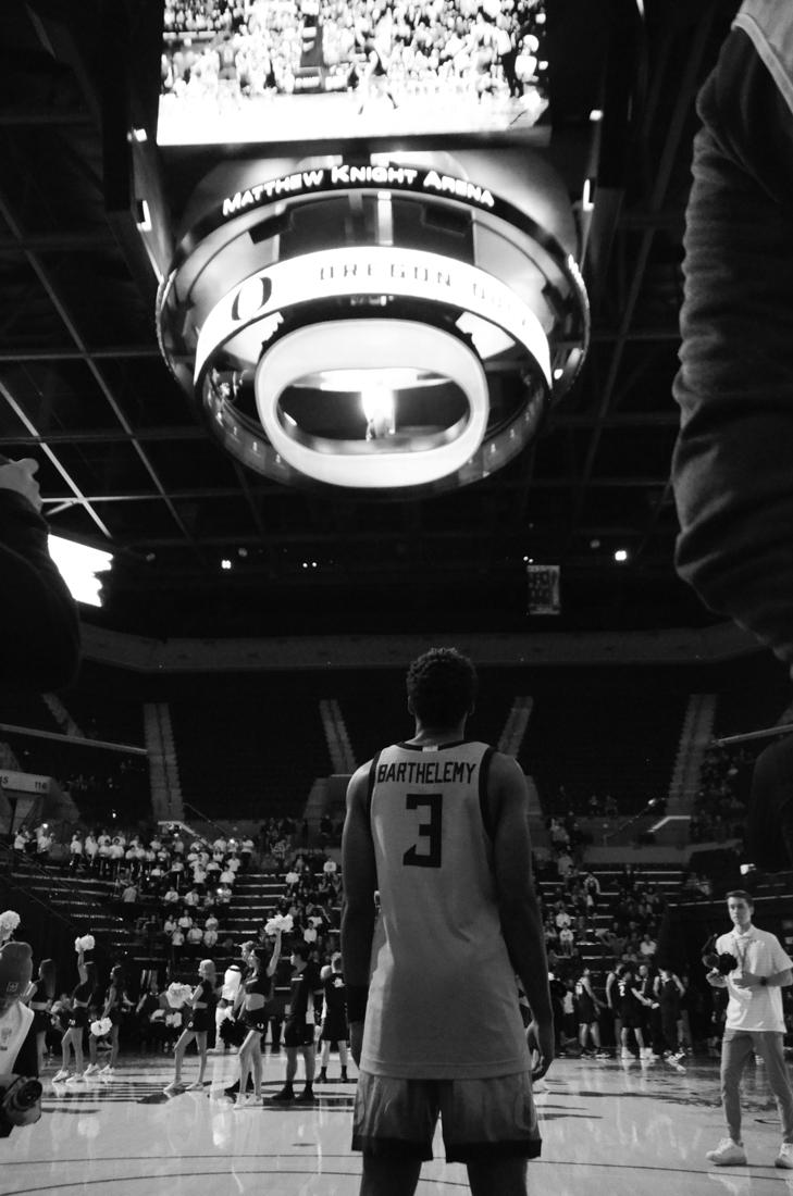 Ducks guard Keeshawn Barthelemy (3) watches the pregame montage on the jumbotron. The University of Oregon Ducks defeat the University of Colorado Buffaloes 75-69 at Matthew Knight Arena in Eugene, Ore., on January 26th, 2023. (Kai Kanzer/Emerald)