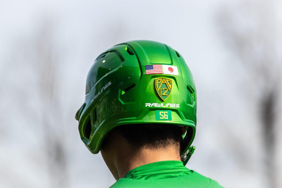 Making his Ducks debut, Rikuu Nishida, dawns his home country's flag.&#160;The Oregon Baseball team takes on Xavier for their season opening series on Feb. 19th, 2023, at PK Park. (Jonathan Suni, Emerald)