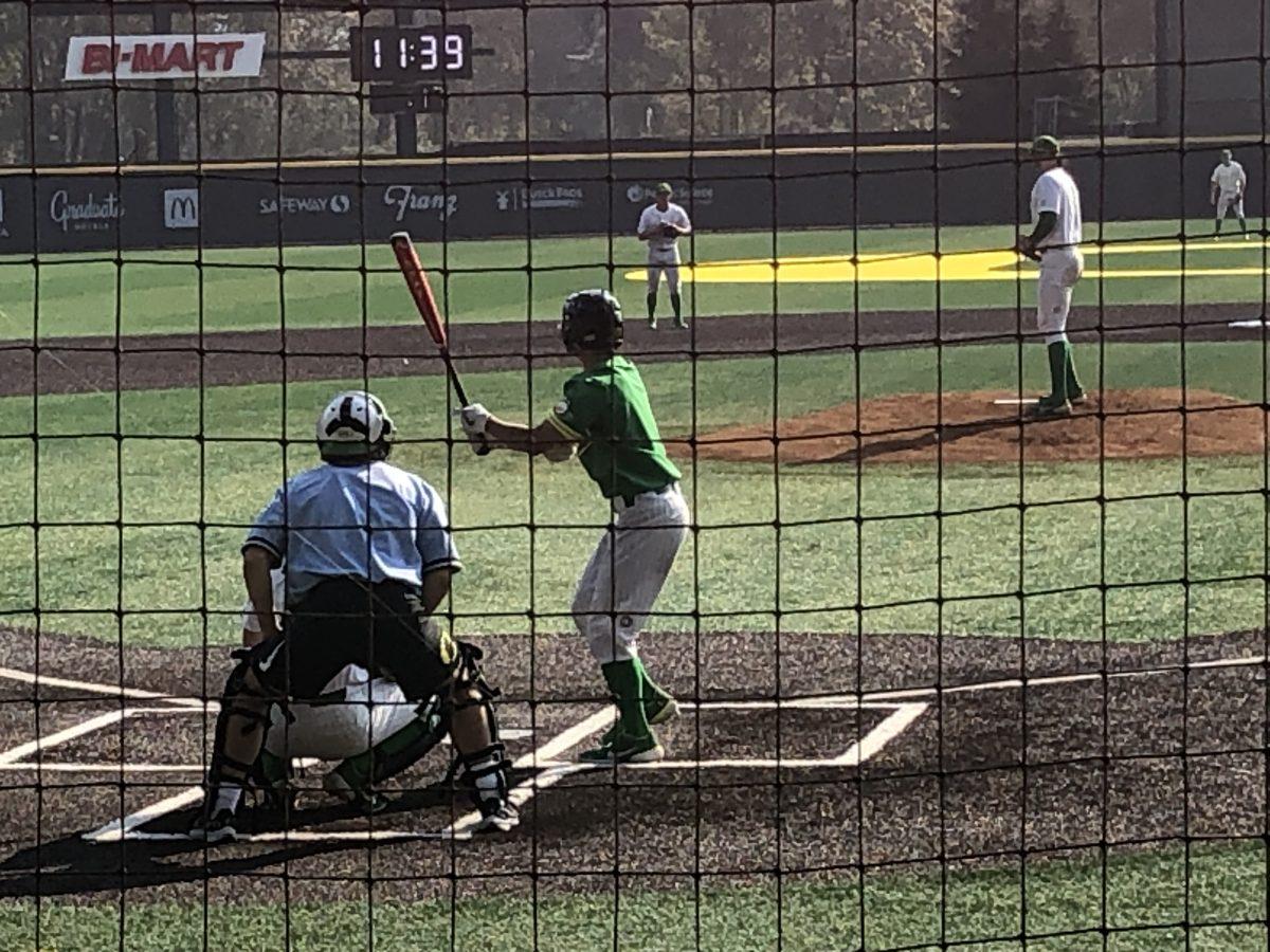 Oregon second baseman Rikuu Nishida facing Isaac Ayon in an intersquad scrimmage.