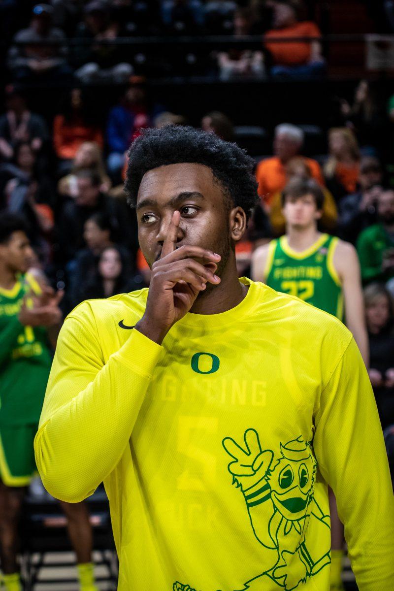 <p>Jermaine Couisnard gives a silencing gesture to the booing Oregon State fans. The Oregon Ducks travel up to Corvallis to face their in-state rival the Oregon State Beavers on Feb. 25, 2023. (Jonathan Suni, Emerald)</p>