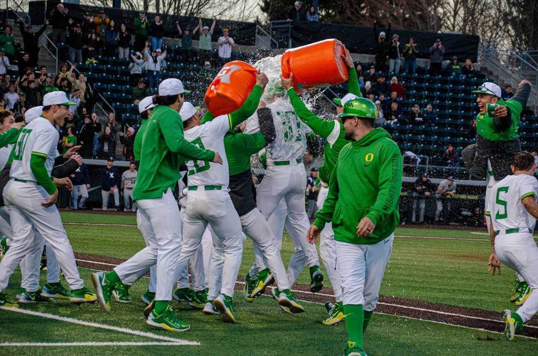 The Oregon Ducks celebrate a walkoff win on opening day. The University of Oregon Ducks defeat Xavier University 3-2 at PK Park in Eugene, Ore., on February 17th, 2023.(Kai Kanzer/Emerald)