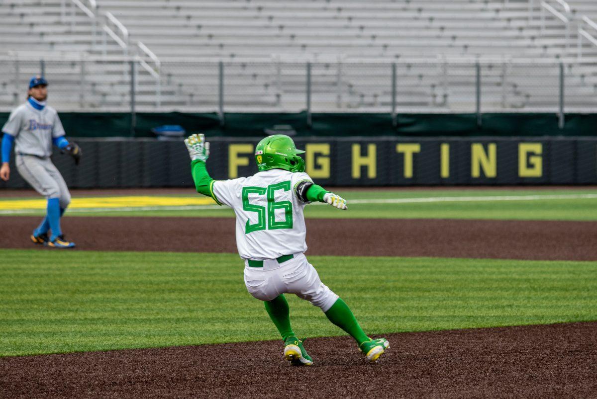 <p>Rikuu Nishida changes directions in a hurry to get back to first base. The Oregon Baseball team begins PAC play for the 2023 season by hosting UCLA on March 10th at PK Park. (Jonathan Suni, Emerald)</p>