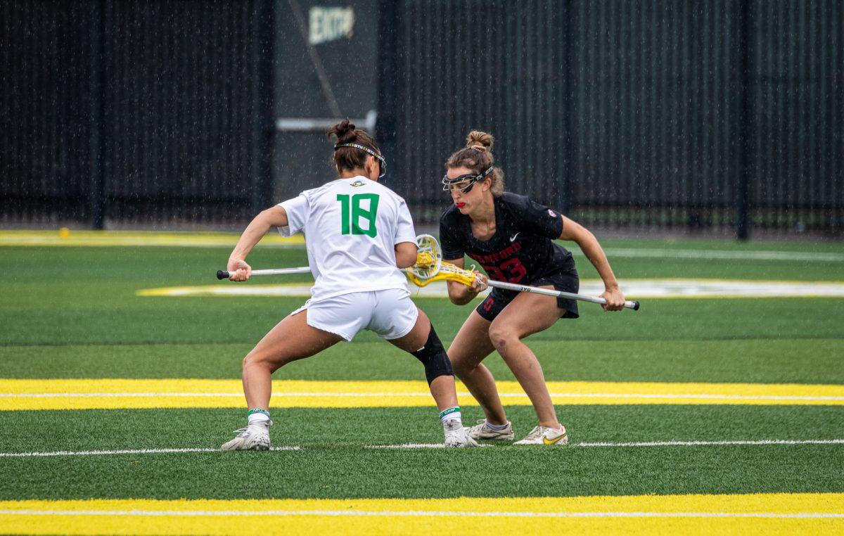 Haley Cummins prepares to take the opening face-off.&#160;The Oregon Ducks Lacrosse team take on Stanford at Pap&#233; Field in Eugene, Ore., on March 19th, 2023. (Jonathan Suni, Emerald)