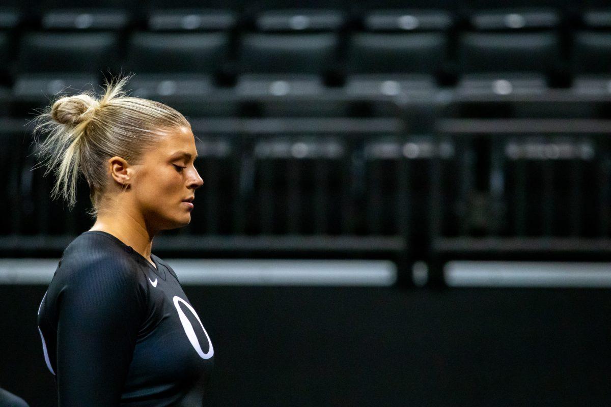 Emilie Henningsen (56) takes a deep breath before taking the mat. The Oregon Acrobatics and Tumbling team takes on Baylor on March 8th, 2023, at Matthew Knight Arena. (Jonathan Suni, Emerald)&#160;