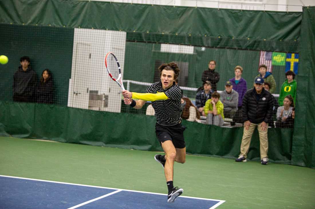 <p>Quinn Vandecasteele returns a serve. Oregon Men's Tennis face off against UC Riverside in Eugene, Oregon on January 20, 2023. (Kai Kanzer/Emerald)</p>