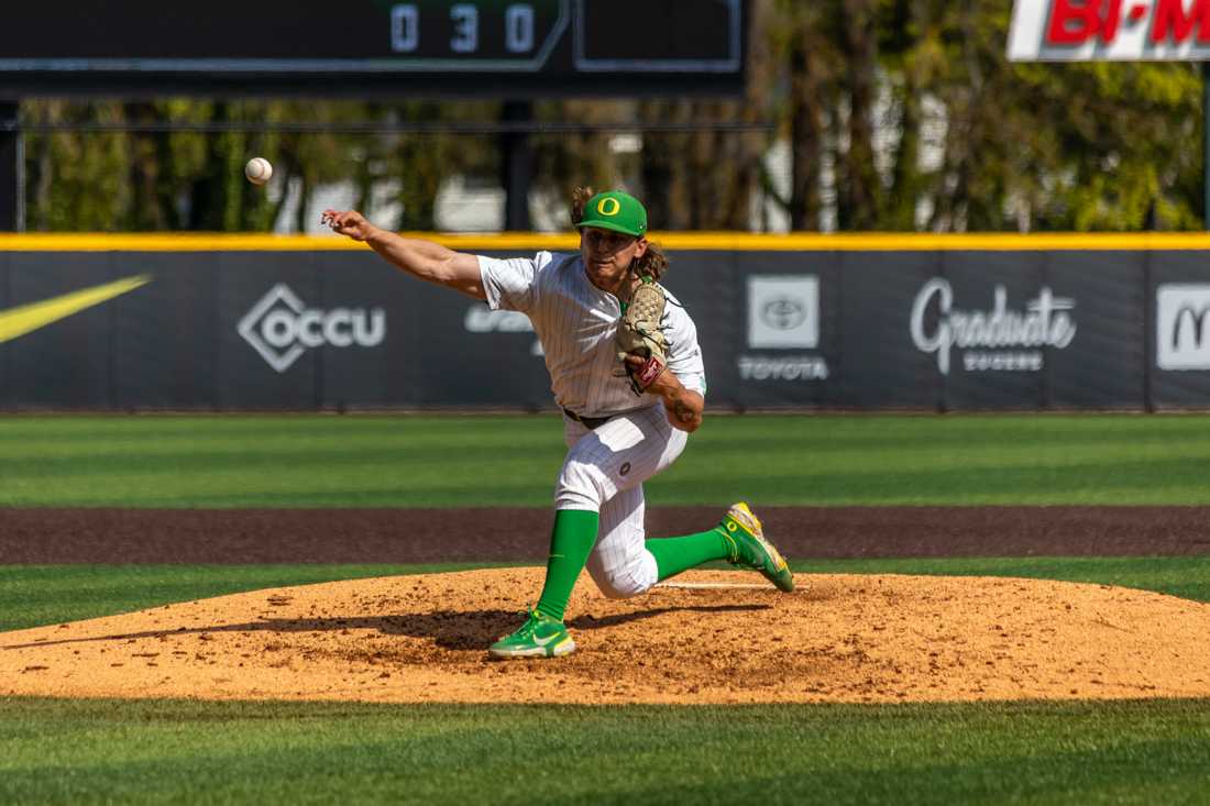 Pitcher Matt Dallas (12) releases the ball. The Oregon Ducks Baseball team takes on Washington State on April 23th, 2022, at PK Park. (Molly McPherson/Emerald)