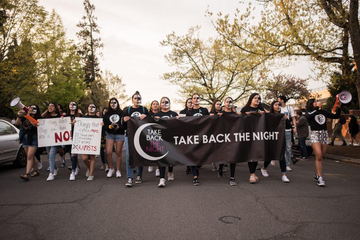 The march begins at the EMU Amphitheater and makes its way toward downtown Eugene. Hundreds attend the annual Take Back the Night march through the streets of Eugene, Ore. on April 25, 2019. (Marissa Willke/Emerald)