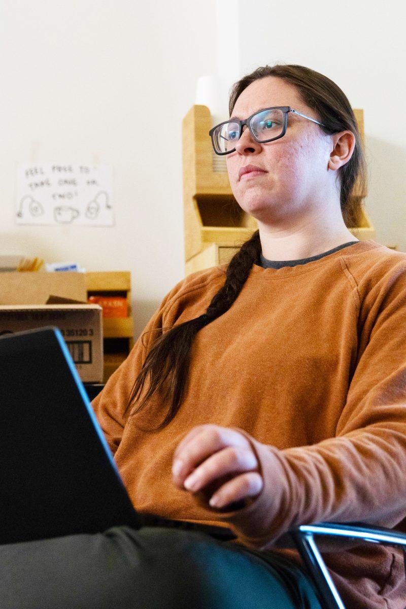 Christine Anderson, a member of the Non-Traditional Student Union, sits in during a meeting to plan upcoming events for students. The Non-Traditional Student Union, located in the Erb Memorial Union, is an office dedicated to servicing the needs of students at the University who are learning non-traditionally. (Maddie Stellingwerf/Emerald)