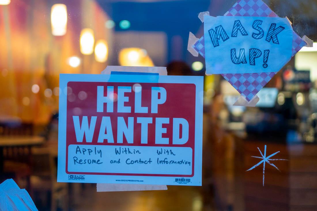 Help Wanted signs are on display throughout Eugene as more Oregonians leave their jobs behind. (Ali Watson/Emerald)