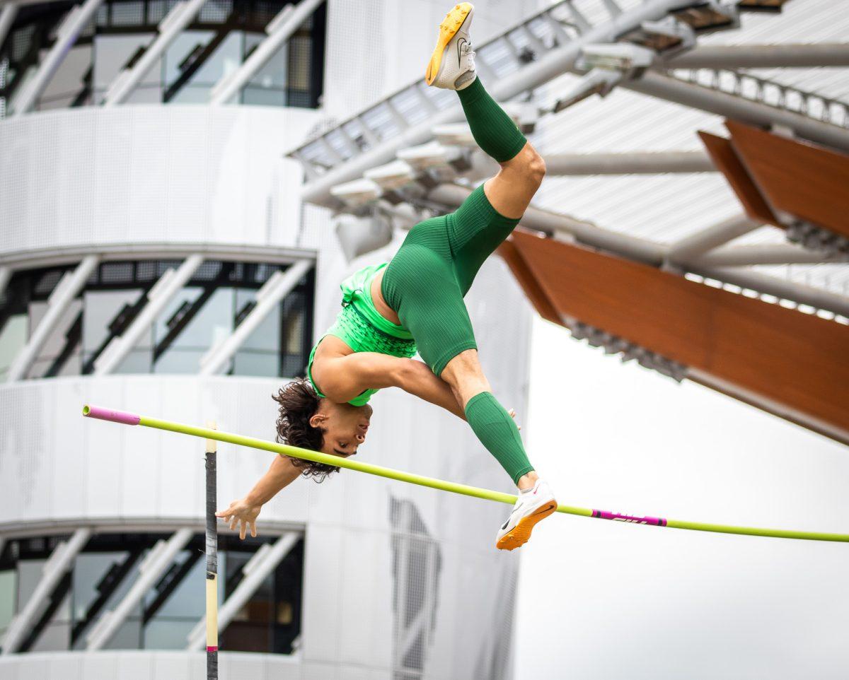 Sophomore pole vaulter, J Kai Yamafuji, soars over the bar but unfortunately knocks it loose.&#160;Athletes representing a variety of universities compete in the annual Oregon Twilight meet at Hayward Stadium in Eugene, Ore., on May 5, 2023. (Jonathan Suni, Emerald)