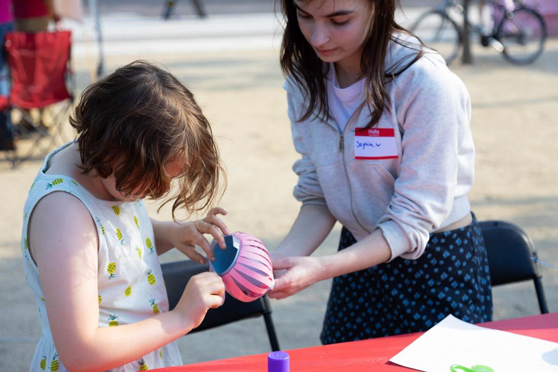 A number of children activities were provided. Seen here is a craft station. The Asian Night Market is celebrated in downtown Eugene, Ore., on May 25, 2023. (Kemper Flood/Emerald).