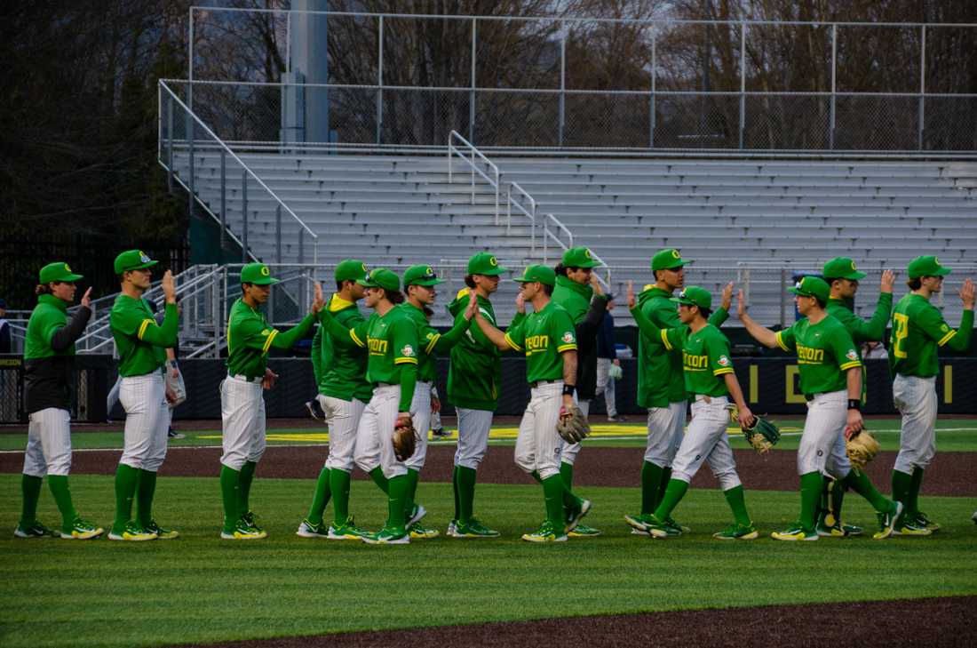 The Oregon Ducks celebrate their third win of the season. The University of Oregon Ducks defeat Xavier University 5-3 in game 2 of the doubleheader at PK Park in Eugene, Ore., on February 18th, 2023.(Kai Kanzer/Emerald)