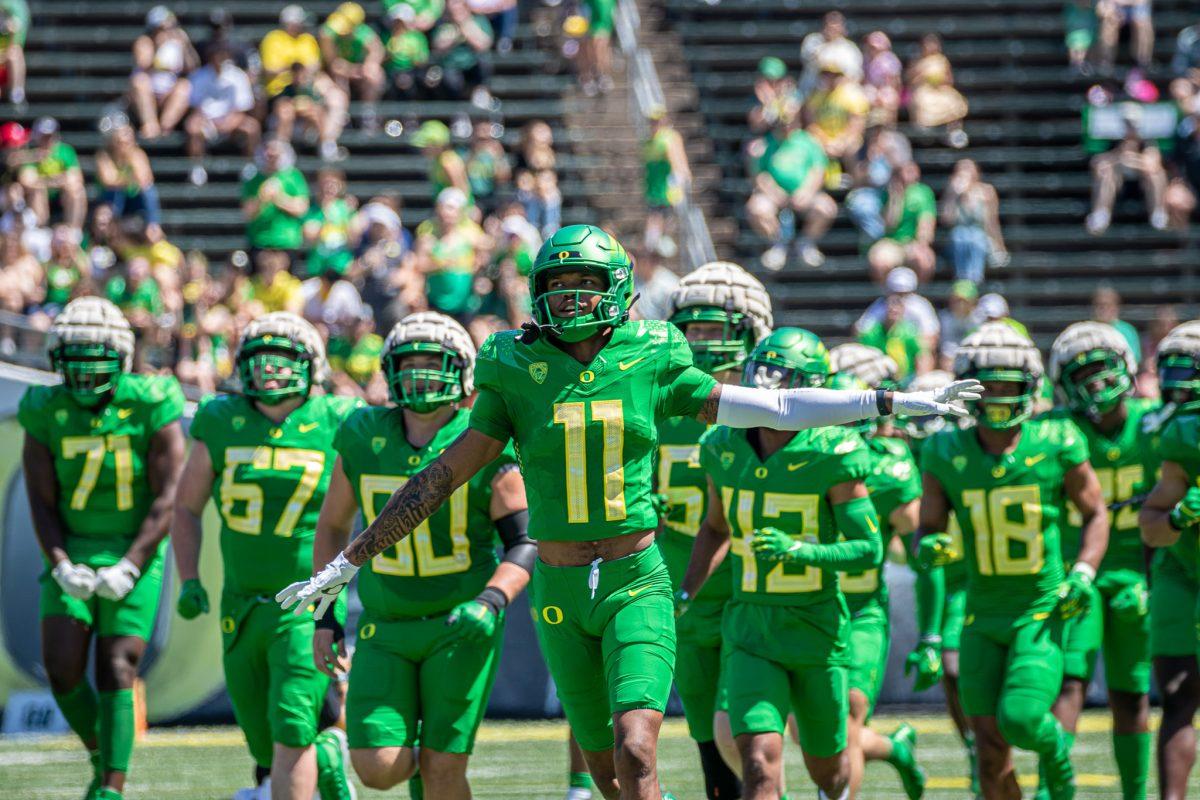 Troy Franklin (11) leads the green team onto the field to start the match.&#160;The University of Oregon holds their annual spring game&#160;at Autzen Stadium in Eugene, Ore., on April 29, 2023. (Jonathan Suni, Emerald)