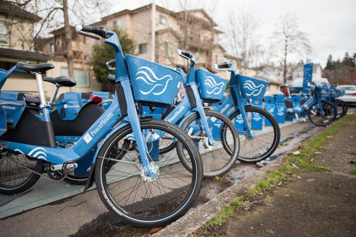 Peacehealth bikes are docked at one of the many racks found around the Eugene. (Marissa Willke/Emerald)