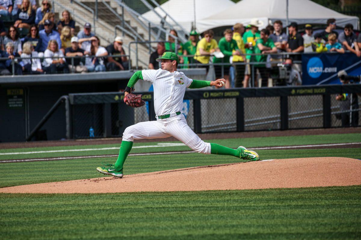 <p>After allowing 0 runs in his last game, freshman Grayson Grinsell (2) allowed 5 runs in just 2.1 pitched. The Oregon Baseball team defeats Oral Roberts in game 1 of Super Regionals on June 9th at PK Park. (Kai Kanzer/Emerald)</p>