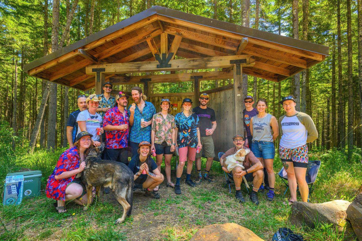 The Dirt Maidens, an inclusive mountain biking collective, held the Ride With Pride community mountain biking event at the Whypass mountain bike trail in Eugene, Oregon, on June 25, 2023. (Eric Becker/Emerald)