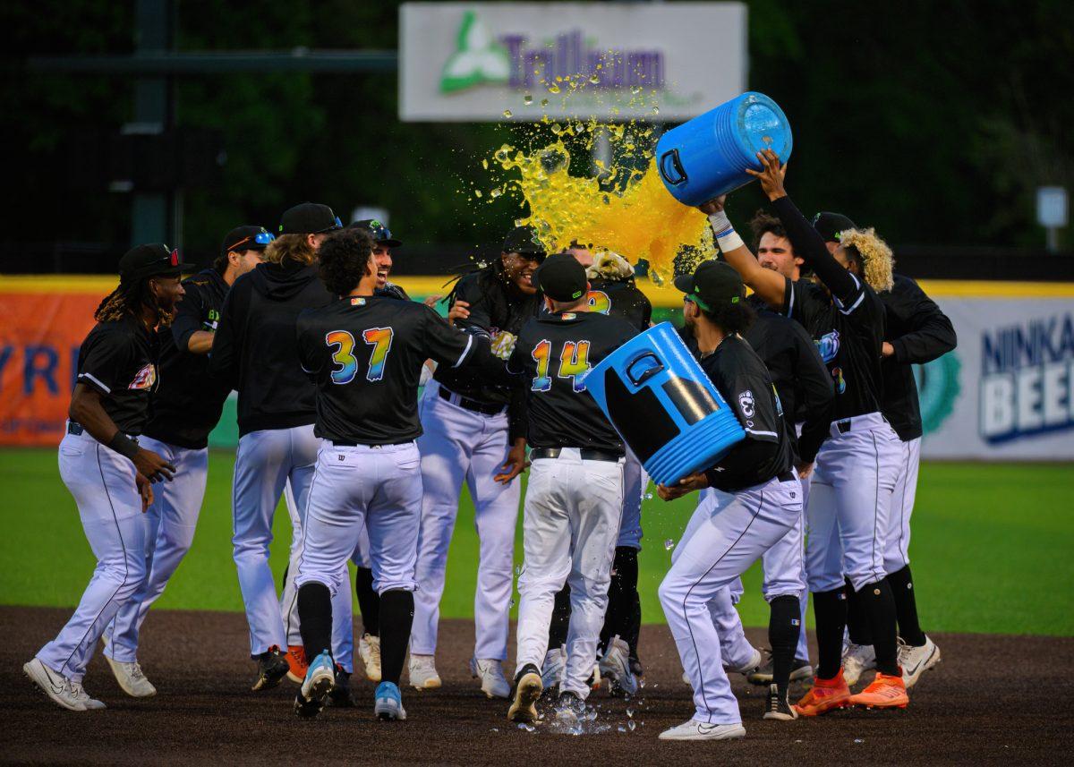 Victor Bericoto is doused with Powerade after hitting a walk off RBI. The Eugene Emeralds beat the Vancouver Canadians by a final score of 2-1 at P.K. Park in Eugene, Oregon, on June 23, 2023. (Eric Becker/Emerald)