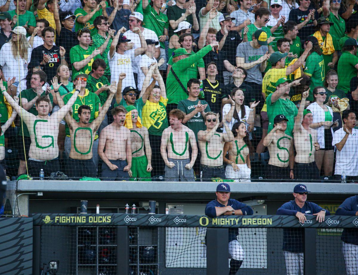 Oregon student section cheers after a Jacob Walsh home run. Oral Roberts defeats the Oregon Baseball team in game 2 of Super Regionals on June 10th at PK Park. (Kai Kanzer/Emerald)