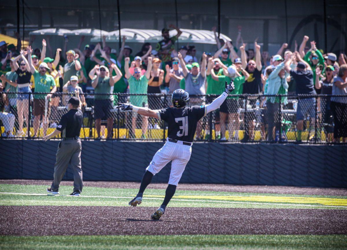 Tanner Smith (31) puts the Ducks in front 3-1 in the bottom of the first. Oral Roberts punches their ticket to the College World Series by defeating the Oregon Baseball team in Game 3 of Super Regionals on June 11th at PK Park. (Kai Kanzer/Emerald)