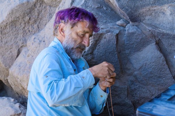 Chuck Morlan prepares to excavate. The University of Oregon Archaeological Field School excavates at the Rimrock Draw Rockshelter near Burns, Oregon, on August 1, 2023. (Eric Becker/Emerald)