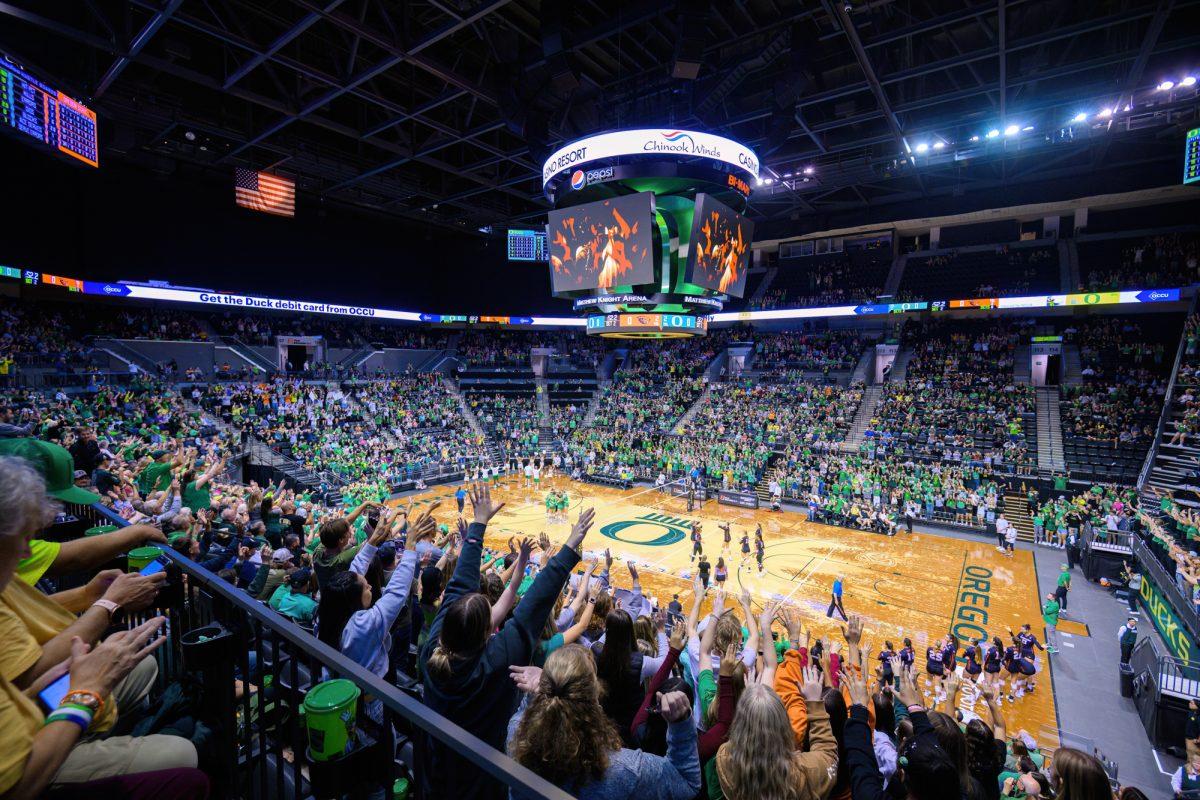 The crowd goes wild during the singing of Shout during the third set. The University of Oregon Ducks Volleyball team defeated the Oregon State Beavers in a home match at Matthew Knight Arena in Eugene, Oregon, on September 22, 2023. (Eric Becker/Emerald)