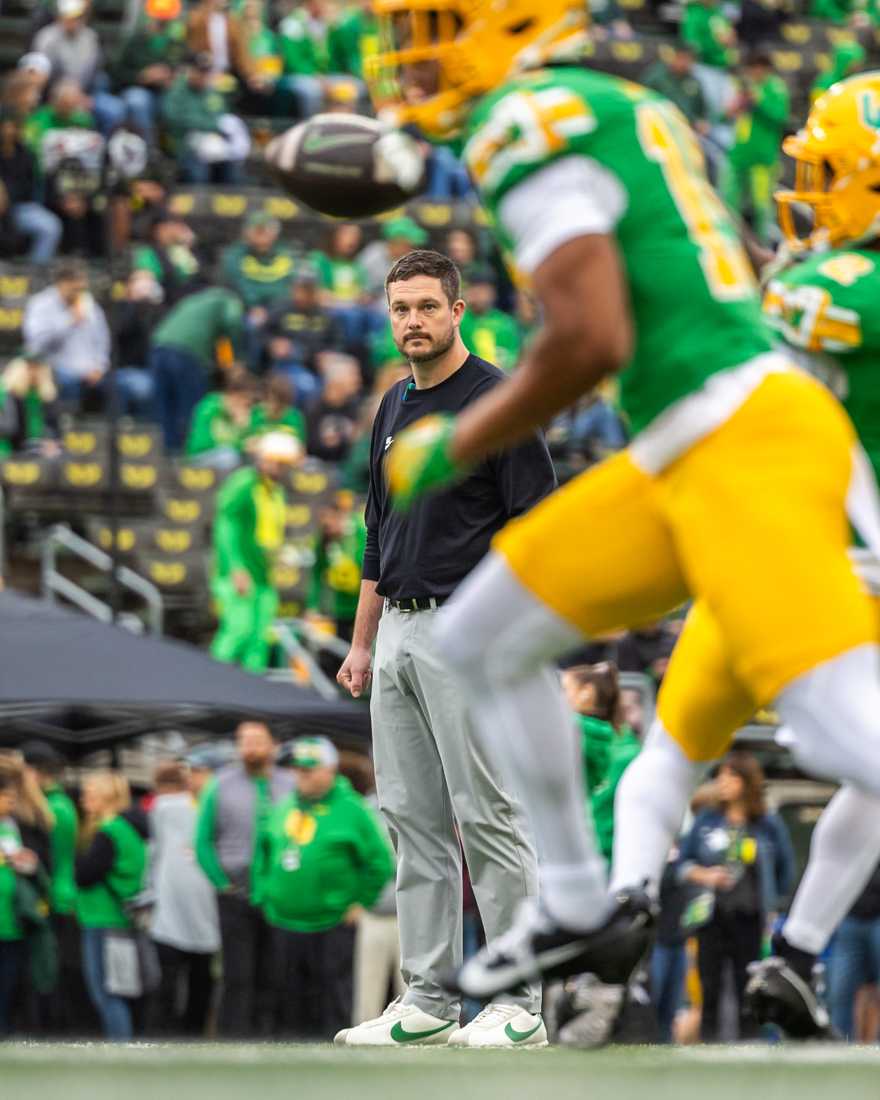 Head coach Dan Lanning watches his team warmup. The Oregon Ducks football team takes on the Washington State Cougars on Oct. 21, 2023, in Eugene, Ore. (Molly McPherson/Emerald)