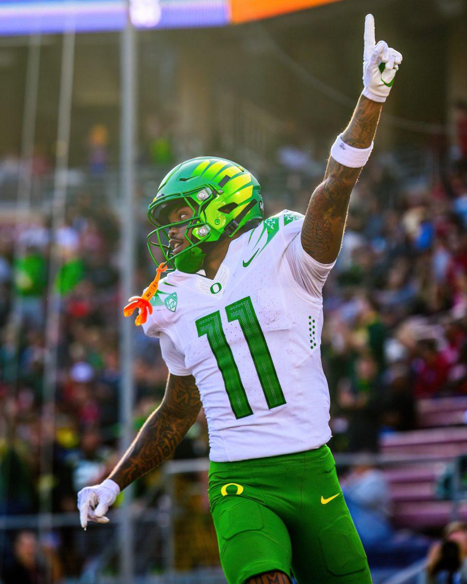 <p>Troy Franklin (11) celebrates after scoring a touchdown. The University of Oregon Ducks football team defeated the Stanford University Cardinals in an away match at Stanford Stadium in Stanford, Calif., on Sept. 30, 2023. (Eric Becker/Emerald)</p>