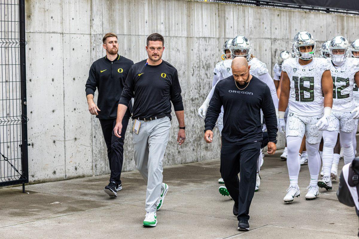 <p>Dan Lanning leads his Oregon Ducks out the visiting locker room into a hostile sold out stadium as he looks to help his team achieve a 6-0 record. The University of Oregon Ducks Football team were defeated by the University of Washington Huskies in an away match at Husky Stadium in Seattle, Washington, on October 14, 2023. (Jonathan Suni/Emerald)</p>