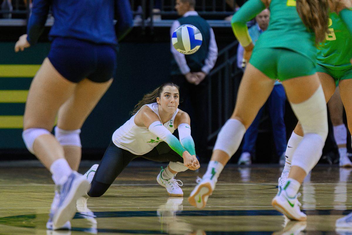 Georgia Murphy (10) dives for the ball. The University of Oregon Ducks Volleyball team defeated the University of California Golden Bears in a home match at Matthew Knight Arena in Eugene, Ore., on Oct. 20, 2023. (Eric Becker/Emerald)