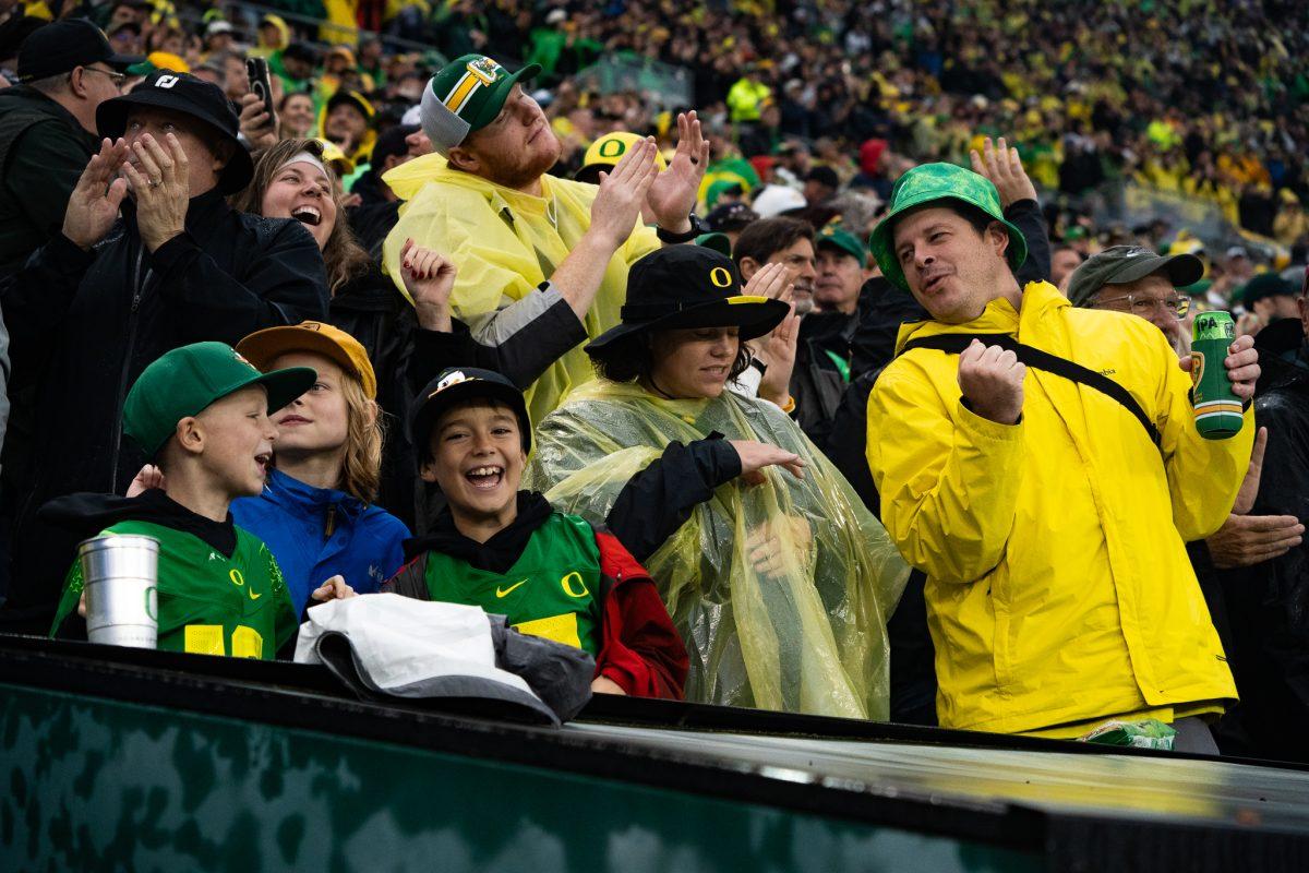 Fans celebrate their Oregon Ducks with lots of joy and happiness. The Oregon Ducks defeat the California Golden Bears 63-19 at Autzen Stadium in Eugene Ore., on Nov. 4, 2023. (Sebastian Flores/Emerald)