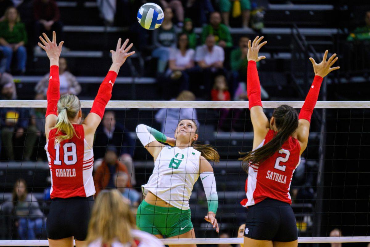 Gabby Gonzales (8) attacks the Utes defense. The University of Oregon Ducks Volleyball team defeated the University of Utah Utes in a home match at Matthew Knight Arena in Eugene, Ore., on Nov. 3, 2023. (Eric Becker/Emerald)