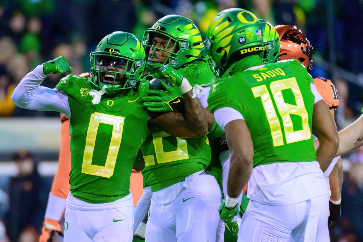 Oregon DB Tysheem Johnson (0) celebrates after making a tackle. The University of Oregon Ducks Football team defeated Oregon State University 31-7 in a home match at Autzen Stadium in Eugene, Ore., on Nov. 24, 2023. (Eric Becker/Emerald)