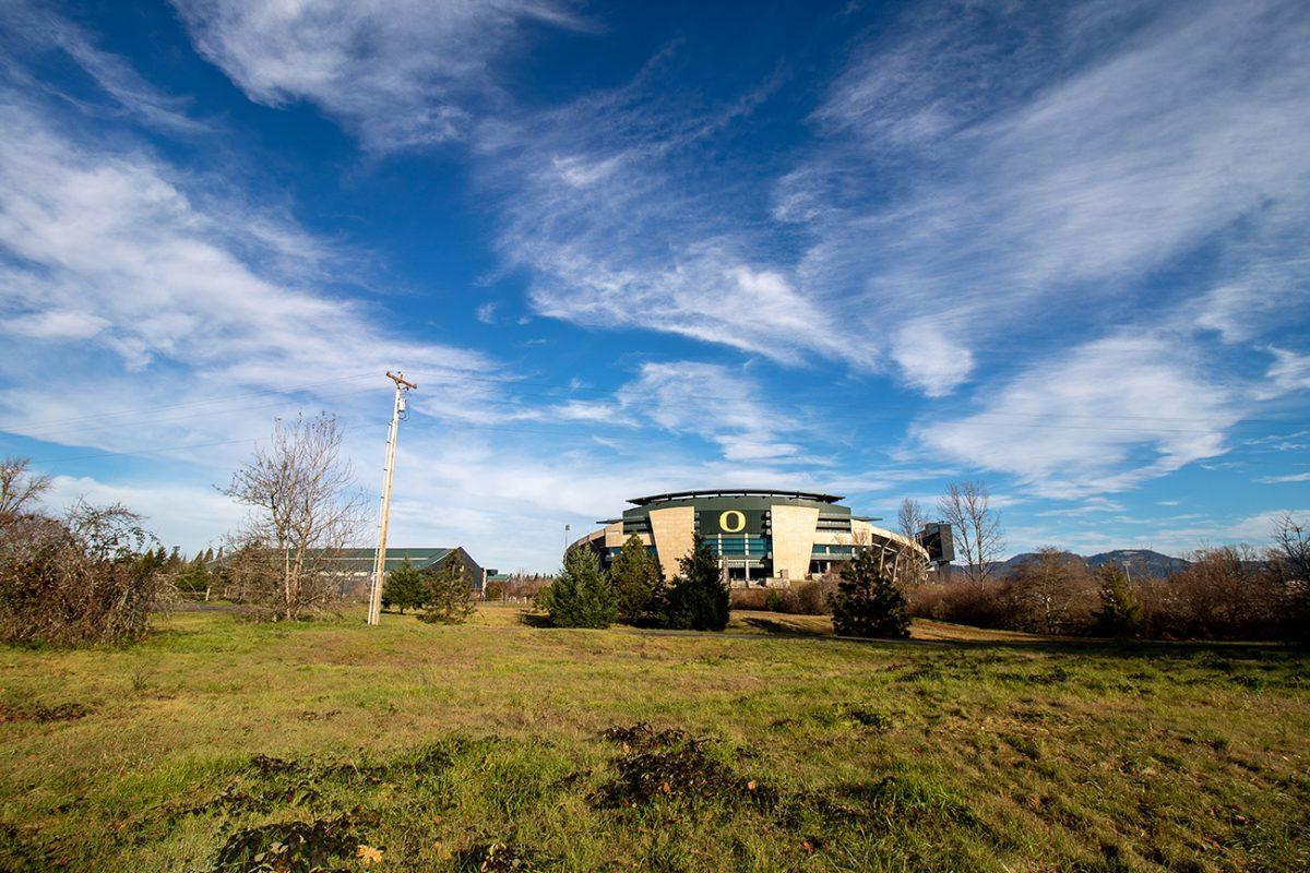 The view of Autzen Stadium from the outside of Alton Baker Park. The pathway students used to walk to Autzen stadium during previous football seasons is eerily empty due to the circumstances surrounding the COVID-19 pandemic. (Will Geschke/Emerald)