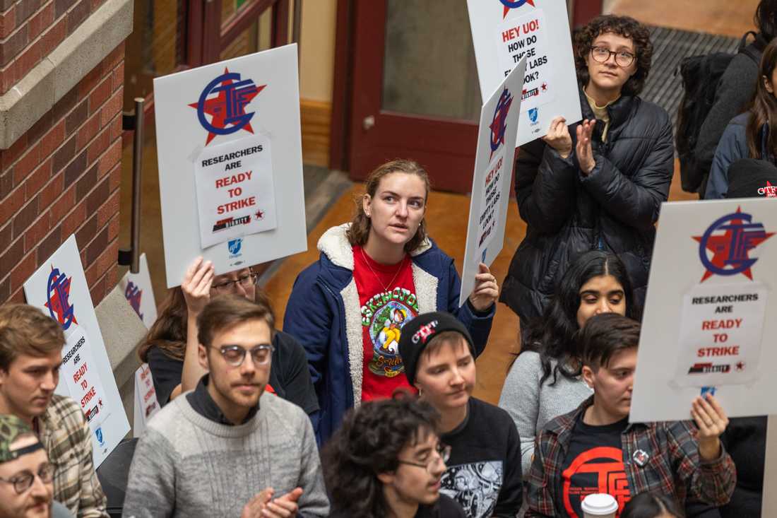 Around 100 graduate researcher employees participated in a walkout demonstration on Nov. 29, 2023 in Willamette Hall. (Molly McPherson/Emerald)