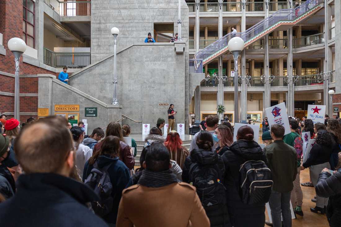 Around 100 graduate researcher employees participated in a walkout demonstration on Nov. 29, 2023 in Willamette Hall. (Molly McPherson/Emerald)